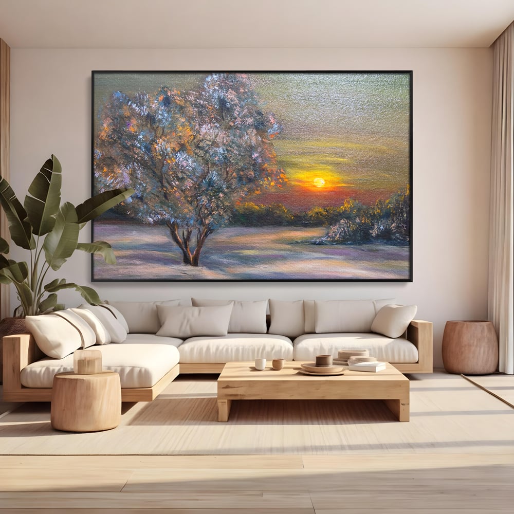 Tablou canvas cu pictura peisaj cu copac si apus, in rama de aluminiu negru, pe perete intr-un living
